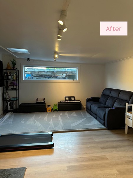 “After photo of clean, organised room in Canberra home with clear surfaces and tidy storage.”